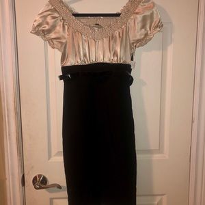 Gold and black dress.